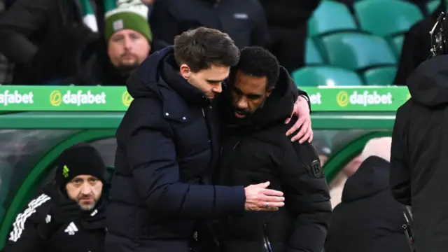 Danny Rohl embraces Wilfried Nancy at the full-time whistle