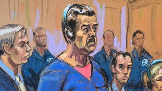 Court sketch of Nicolas Maduro in court in New York, he is drawn as wearing a blue outfit and is wearing headphones