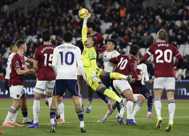 Areola claws the ball away