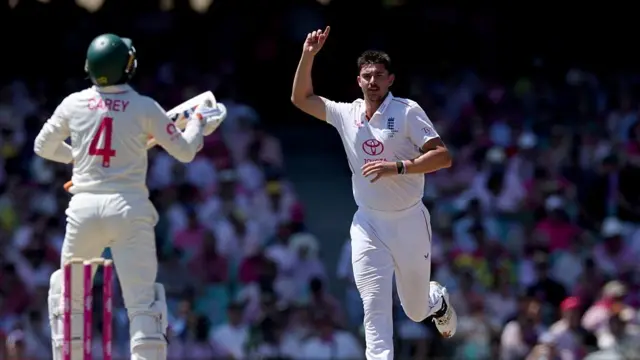 Australia's Alex Carey (L) reacts after being dismissed by England's Josh Tongue