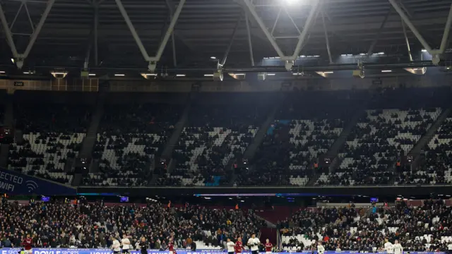 Empty stands as play continues in London