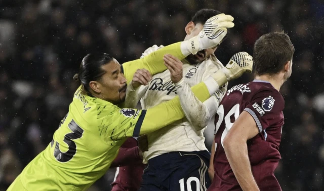West Ham United's Alphonse Areola fouls Nottingham Forest's Morgan Gibbs-White resulting in a penalty kick