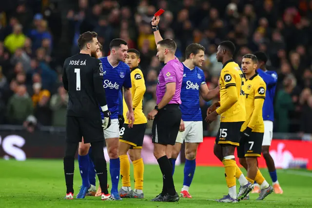 Michael Keane of Everton is shown the red card by referee Thomas Kirk