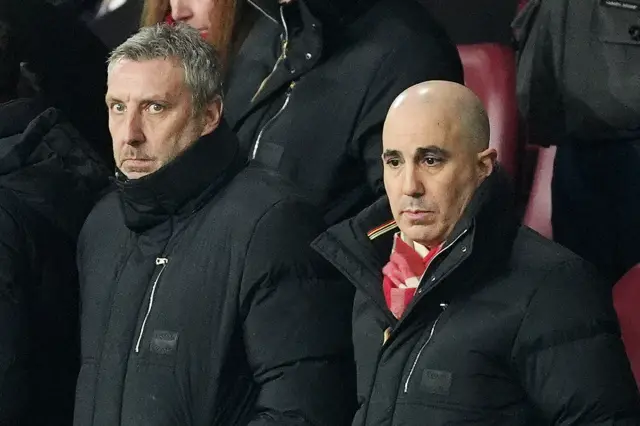 Manchester United Technical Director Jason Wilcox (left) and CEO Omar Berrada watch on in the stands d
