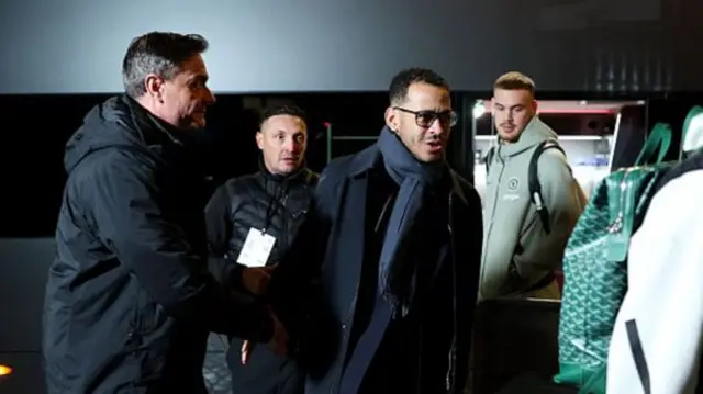 Liam Rosenior smiling while walking into Craven Cottage