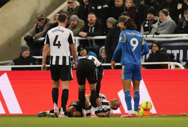 Newcastle United's Fabian Schar reacts after sustaining an injury