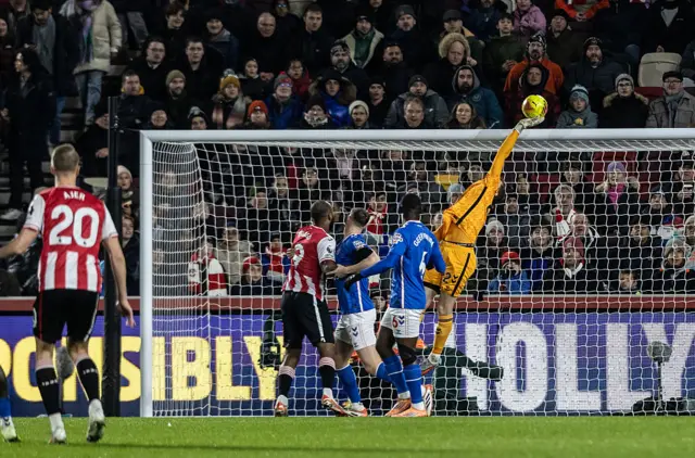 Sunderland's goalkeeper Robin Roefs competing with Brentford's makes a save