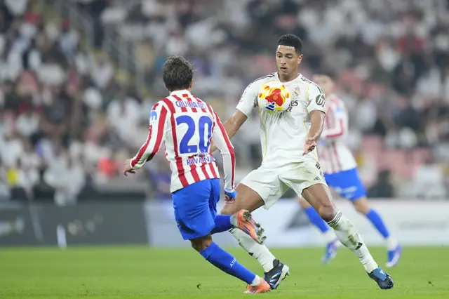 Real's Jude Bellingham takes the ball on his chest under pressure