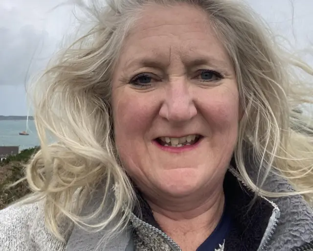 Samantha Mallon, of Toots Taxi, in a slefie with windswept blonde hair