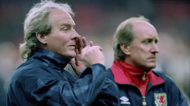 Terry Yorath (left) issues instructions as Wales manager