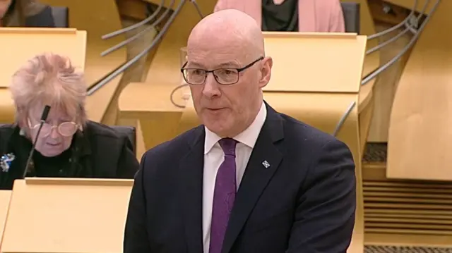 John Swinney in Scottish Parliament