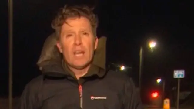 Kirk England stood in front of some traffic lights near the Hoe in Plymouth
