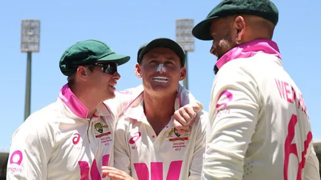 Steve Smith with Marnus Labuschagne and Jake Wetherald