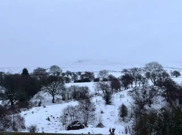 snow covered hills stretching into the distance