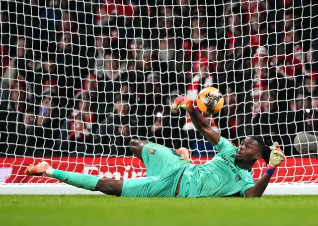 Okonkwo saves to win the shootout for Wrexham