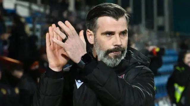 Ross County manager Stuart Kettlewell applauds