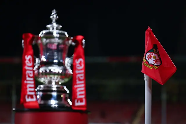 FA Cup trophy by the corner flag