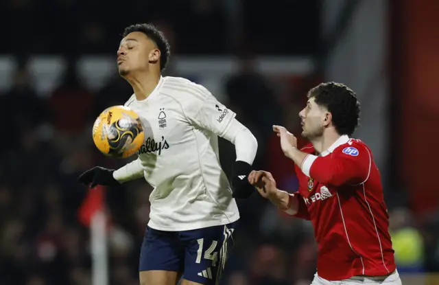 Ndoye in action with Wrexham's Liberato Cacace