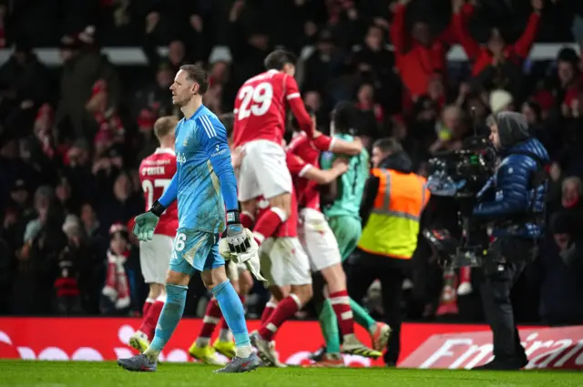 Sels trudges to join his defeated teammates as Wrexham celebrate