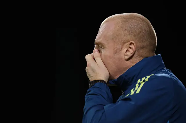 Dyche covers his mouth in disbelief