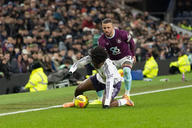 Kyle Walker and Patrick Dorgu battle for the ball