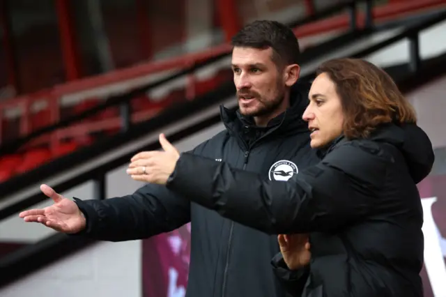 Arroyo and Vidosic chat before the reverse fixture at Broadfield Stadium