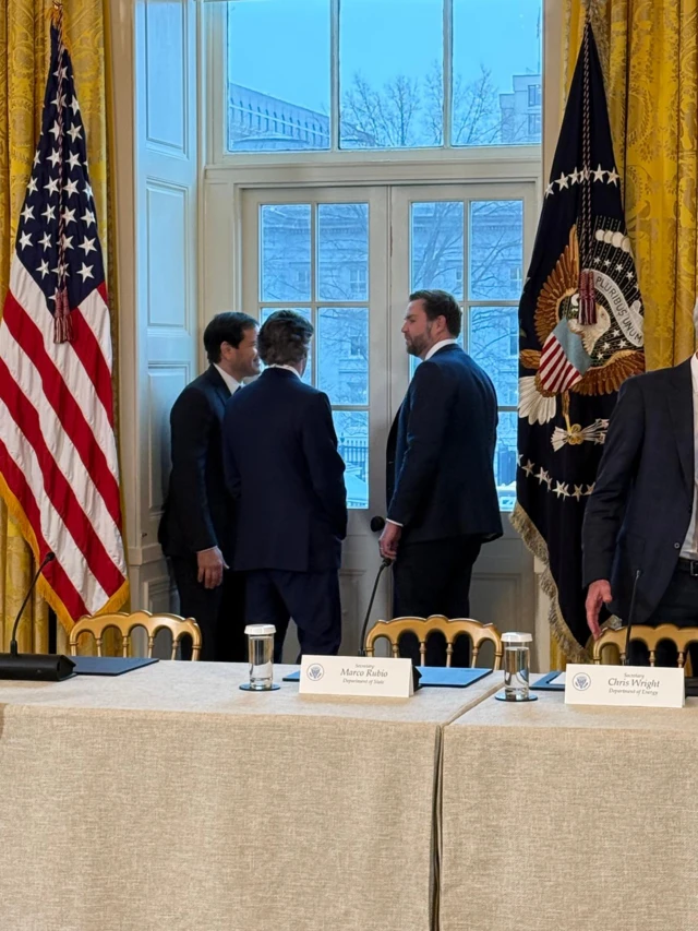 Marco Rubio, JD Vance and Doug Bergum view ballroom construction progress out the window of the White House