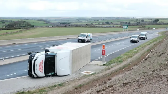 An overturned van on the A30 near Blackwater, Cornwall