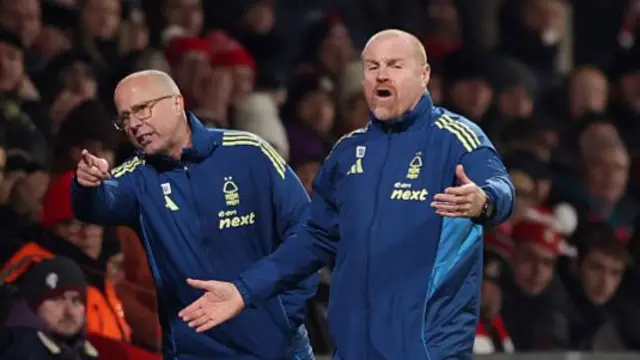 Dyche and Woan complain to the officials