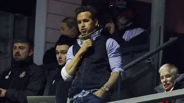 Ryan Reynolds blows out his cheeks