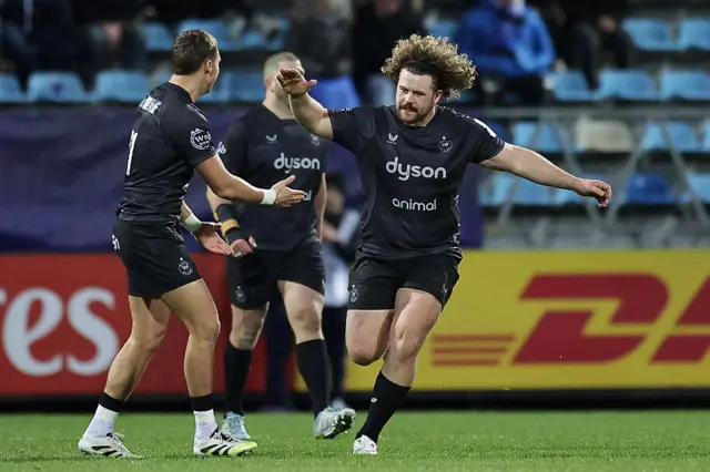 Alfie Barbeary of Bath celebrates with a team-mate