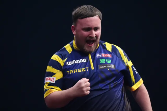 England's Luke Littler during his match against Wales' Gerwyn Price during day four of the Winmau World Masters at Arena MK, Milton Keynes