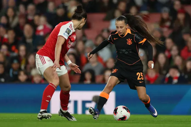 Belen Aquino (R) runs with the ball