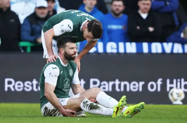Hibs defender Grant Hanley was forced off with an injury