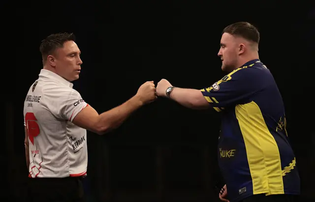 Gerwyn Price and Luke Littler bump fists