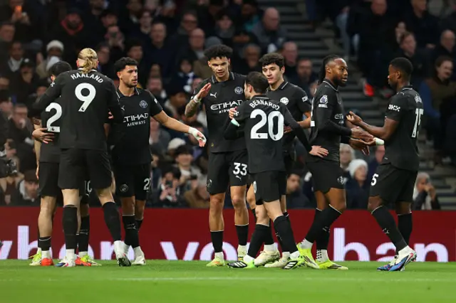 Rayan Cherki of Manchester City celebrates with teammates
