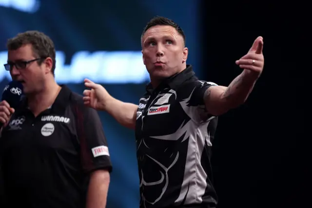 Wales' Gerwyn Price during his match against England's Luke Littler during day four of the Winmau World Masters at Arena MK, Milton Keynes