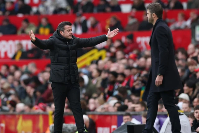 Marco Silva gestures next to Michael Carrick