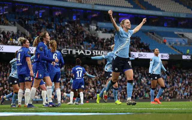 Vivianne Miedema of Manchester City celebrates scoring her team's fifth goal