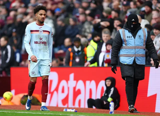 Kevin Schade of Brentford walks off the pitch
