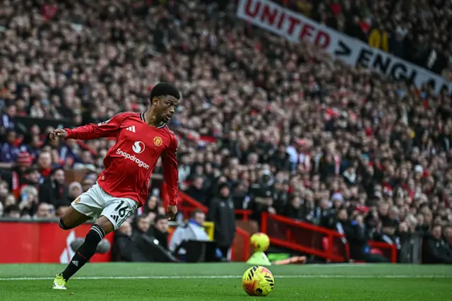 Manchester United's Ivorian forward Amad Diallo looks to pass the ball