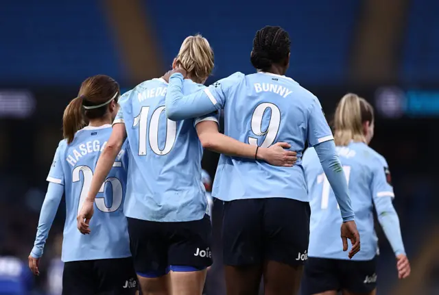 Vivianne Miedema of Manchester City celebrates scoring her team's fifth goal with teammate Khadija Shaw