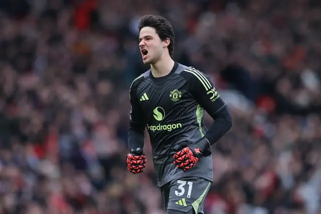 Senne Lammens of Manchester United looks on