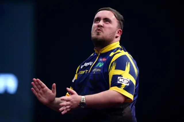England's Luke Littler during his match against Wales' Gerwyn Price during day four of the Winmau World Masters at Arena MK, Milton Keynes