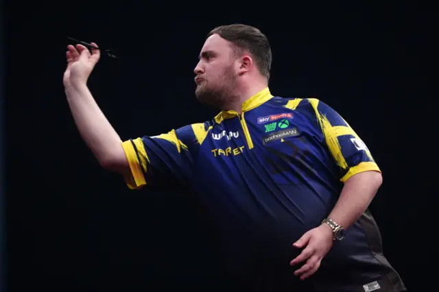 England's Luke Littler during his match against Wales' Gerwyn Price during day four of the Winmau World Masters at Arena MK, Milton Keynes
