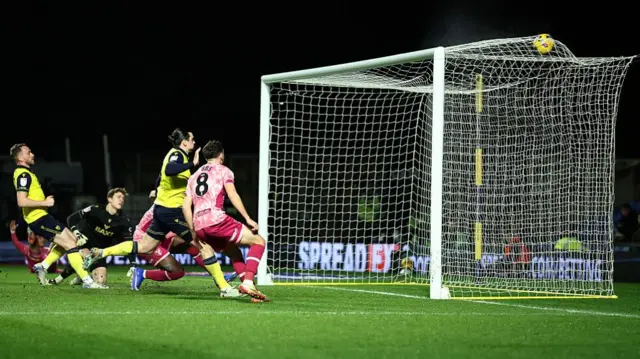Mohamed Toure scores from close range against Oxford