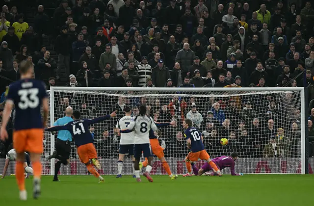Newcastle United's English midfielder #28 Joe Willock scores, but the goal is disallowed following a VAR review, during the English Premier League football match between Tottenham Hotspur and Newcastle United at the Tottenham Hotspur Stadium in London, on February 10, 2026.