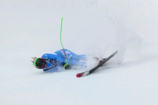 Italy's Sofia Goggia crashes as she competes in the downhill run of the women's team combined event