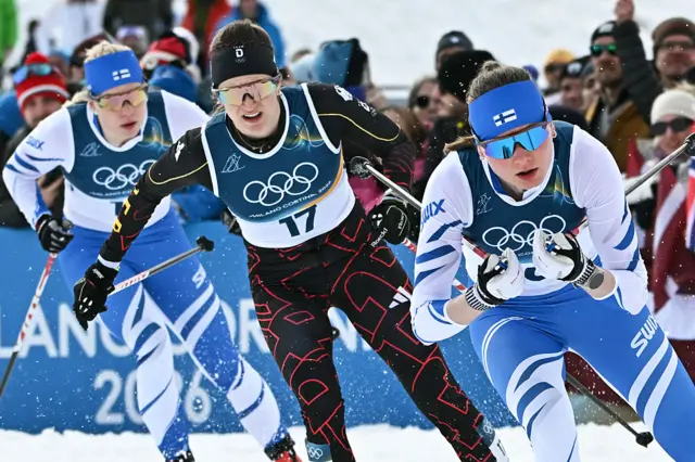 Finland's Amanda Saari, Germany's Laura Gimmler and Finland's Johanna Matintalo compete in heat 3