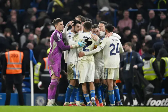 Leeds celebrate a draw with Chelsea